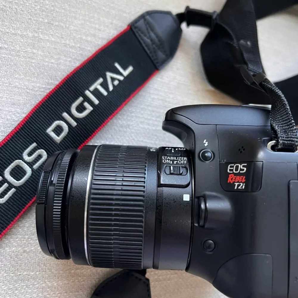 Canon Digital Camera with Interchangeable Lenses and LCD Screen with strap & bag